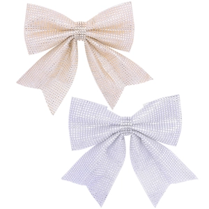 Sparkling gold and silver glitter Christmas bows for festive tree and window decorations