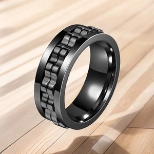 Close-up of black gear spinning titanium steel anti-anxiety ring for men