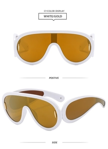 White Y2K oversized sunglasses with gold mirrored lenses and metallic temple accents