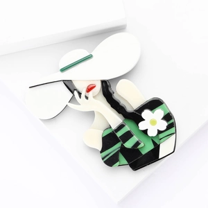 Creative acrylic cartoon brooch featuring a lady in wide-brimmed white hat and green outfit