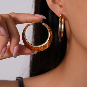 Chic amber resin geometric hoop earrings with gold metal frame for a retro look