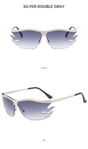Detailed views of flame-shaped silver metal sunglasses with gradient gray lenses