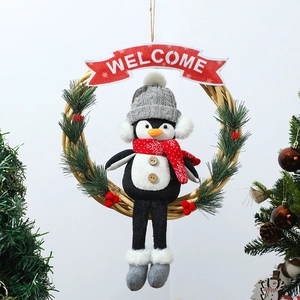 Christmas penguin wreath with welcome banner and pine needles for door decoration