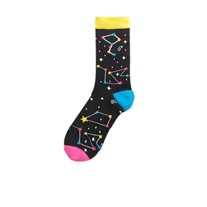 Detailed close-up of cosmic star patterns and colorful contrast heel on black crew socks