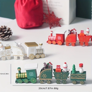 Green wooden Christmas train set with Santa and snowman figures for festive table decor