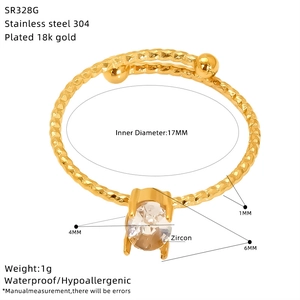 Detail of adjustable 18k gold plated stainless steel ring with moon-shaped zircon stone