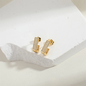 Elegant 18K gold rectangular stud earrings with micro-paved white cubic zirconia stones