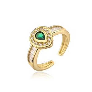 Vintage gold open ring featuring a green teardrop zircon and pavé crystal accents