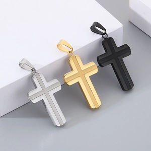 Three minimalist stainless steel cross pendants in silver gold and black finishes