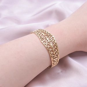 18k gold plated stainless steel open bangle with intricate filigree pattern for women