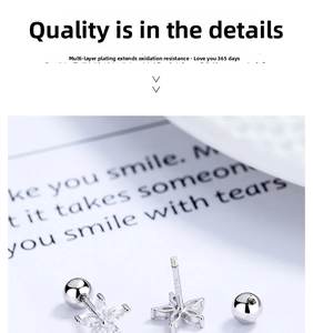 Detail of S925 sterling silver flower stud earrings with zircon and threaded ball backings