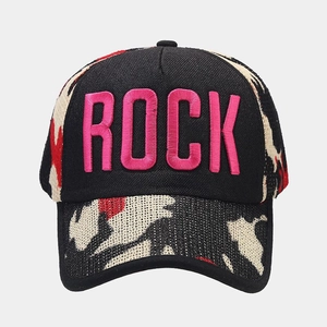 Detail of pink ROCK 3D embroidery on black and camouflage canvas baseball cap
