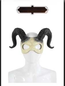 Detail of white devil horn mask featuring vintage texture and cracked patterns