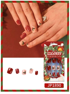 Detail of JP1890 Christmas press-on nails with red glitter and hand-painted mistletoe