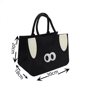 Black cartoon felt tote bag with cute puppy ears and dimensions 30x20x18cm on white background
