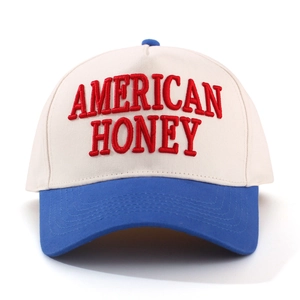 Close-up of AMERICAN HONEY red embroidery on cotton twill baseball cap panel