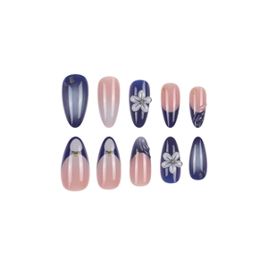 Blue and pink almond press-on nails with 3D floral patterns and gold foil accents