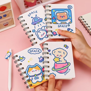Set of four cute cartoon astronaut mini spiral notebooks with space animal designs