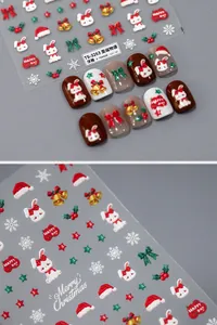 Detailed 3D embossed Christmas nail stickers featuring rabbits, bells, and snowflakes