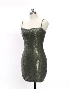 Detailed view of dark green sequin mini dress showing shimmering fabric texture