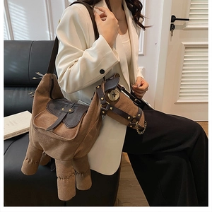 Funny donkey-shaped shoulder bag featuring brown canvas texture and decorative harness details