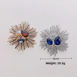 Detail view of sunflower brooches with colorful rhinestones measuring 6cm in diameter