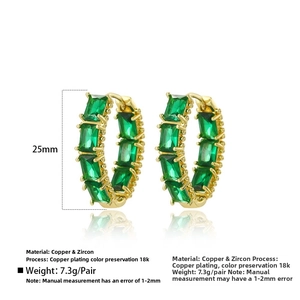 Detail view of 25mm gold hoop earrings with rectangular green zircon and 7.3g weight data