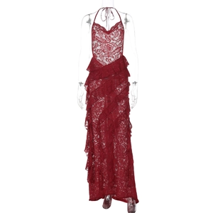 Detail of red lace halter maxi dress featuring layered ruffles and intricate floral crochet