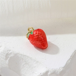 Cute strawberry pendant charm in 14K gold-plated metal with vibrant red enamel finish