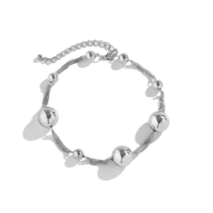 Detailed view of silver layered bead choker with lobster clasp and extension chain