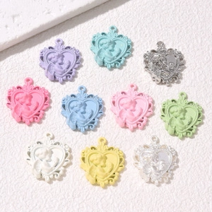 Detailed collection of 10 colorful heart-shaped angel relief pendants for DIY jewelry