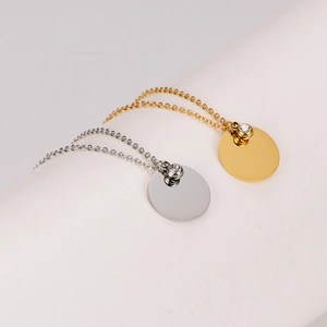 Minimalist stainless steel circular necklaces in gold and silver with zircon accents