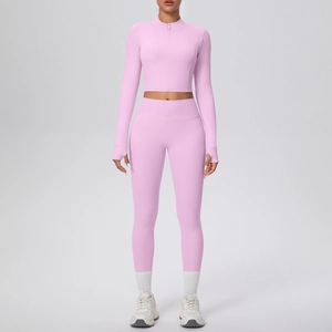 Ensemble de yoga rose avec passe-pouces, fermeture éclair et legging de sport taille haute