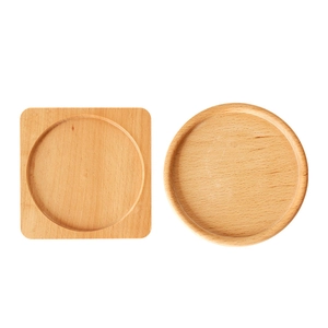 Square and round solid wood coasters set with natural grain on white background