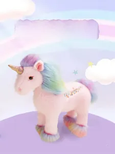 Detail of pink plush unicorn with rainbow mane and Wisdom embroidery on side