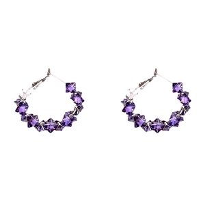 Silver hoop earrings with faceted purple crystals featuring a geometric diamond cut design