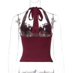 Detailed back view of a wine red halter top featuring delicate lace trim and open back design
