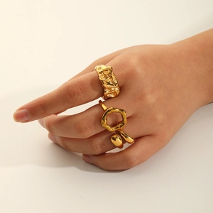 Lava style 18k gold plated stainless steel ring with irregular geometric wave design