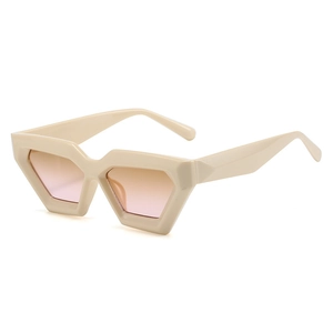 Minimalist geometric cat-eye sunglasses with cream frames and gradient lenses on white backdrop