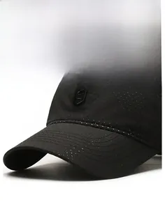 Detail of a black breathable mesh baseball cap with shield-shaped 'S' badge and stiff brim