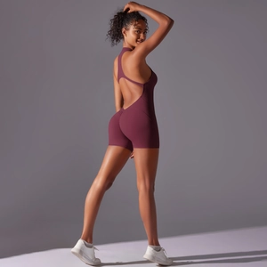 Detail of the high-stretch deep burgundy backless yoga bodysuit with athletic racerback cut