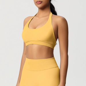 Détail de l'ensemble brassière de sport licou et legging sans couture jaune gingembre