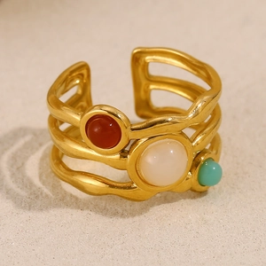 Close-up of 18K gold-plated double-layer ring with red, white and green zircon stones