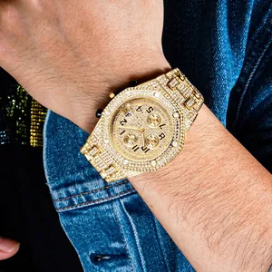 Iced-out gold men's watch featuring a full diamond octagon case and chronograph dial