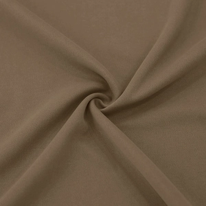 Detailed macro view of dark coffee men's trench coat fabric texture and fine weave