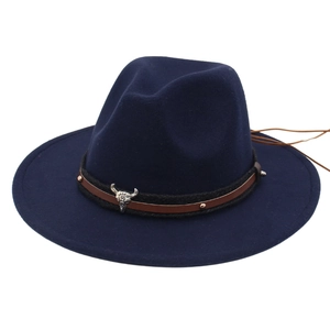 Detail of navy blue felt fedora with brown leather band and silver bull head badge