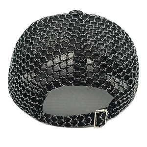 Detail of black mesh baseball cap showing silver wavy embroidery and metal adjustment buckle