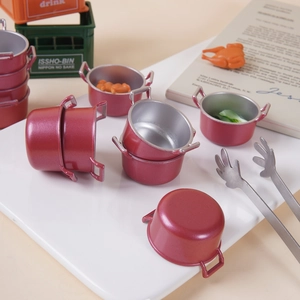 Miniature dollhouse soup pot set with pearlescent red finish and tiny toy food accessories