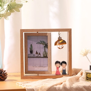 6-inch rotating wooden picture frame with couple figurines and mini lantern decoration