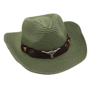 Close-up of green woven cowboy hat featuring a silver bull head and vintage metal logos